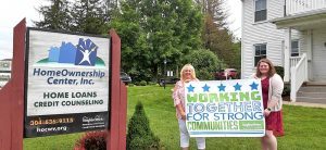Chris and Jami with sign.