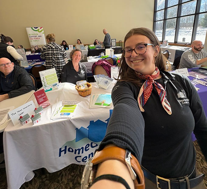 Geneva Brown selfie with Kate Somers in background at the WorkForce West Virginia resource fair.