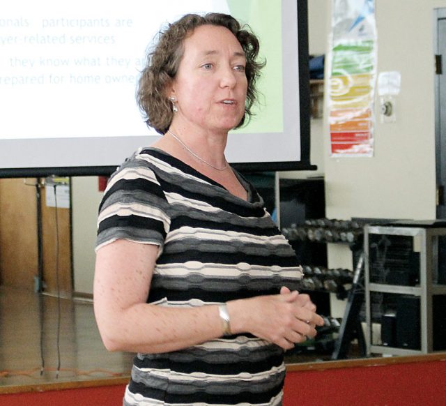 Kate Somers gives a presentation to the Rotary Club of Elkins Monday about how the HomeOwnership Center, located in Elkins, offers assistance to citizens of north central West Virginia.